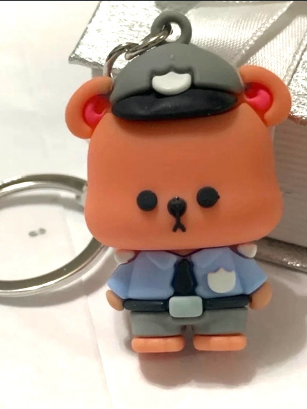 Little brown bear policeman silicone keychain